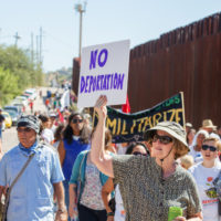 sign that reads no Deportations