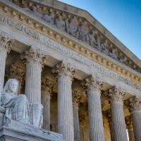 A summer day in front of the US Supreme Court Building in Washington, DC. A summer day in front of the US Supreme Court Building in Washington, DC.